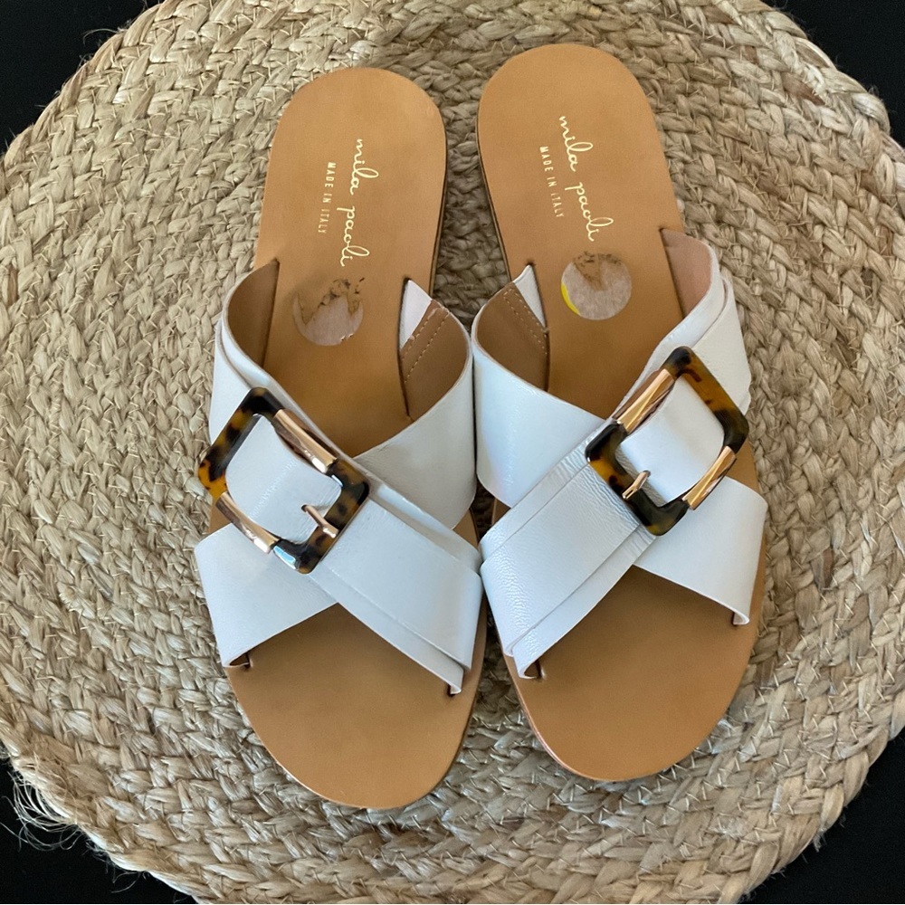 Mila Paoli leather slides with tortoise and gold tone buckle. Size 9